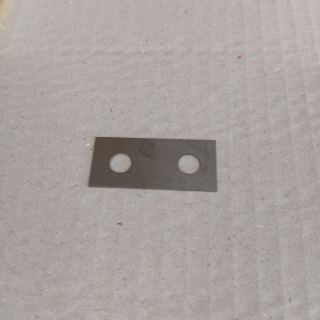 Příložka vyrovnávací PV3S 40x18x0,5 mm - k zarážce zpětného chodu