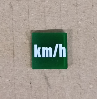Symbol překlápěcího přepínače - 14x14mm - zelený - km/h