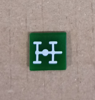Symbol překlápěcího přepínače - 14x14mm - zelený - náprava, typ 1